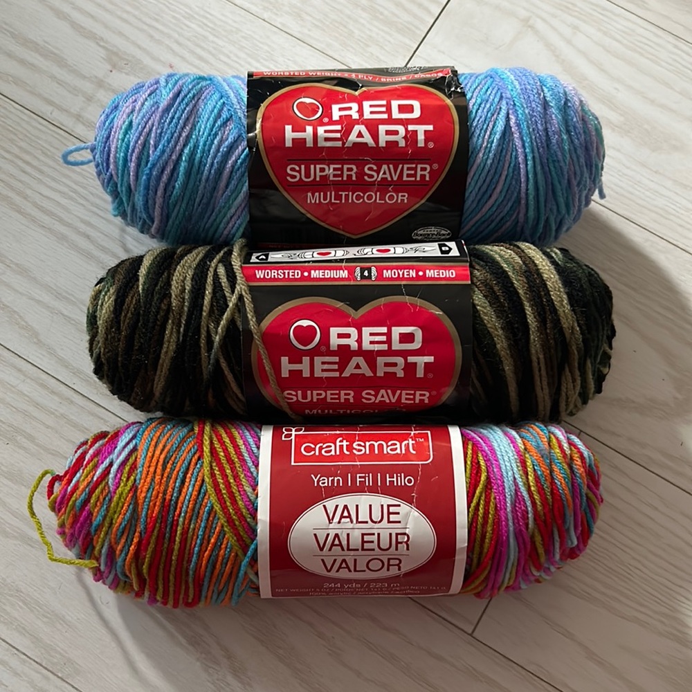 3 skeins multi-color acrylic yarn